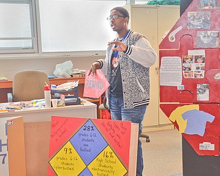 Marquan Stevenson, 11th grade, a member of the Destination Imagination group at East East School, talks about some of the bullying statistics that the group discovered on Monday, April 9, 2018.

Photo by Scott Williams - The Vindicator