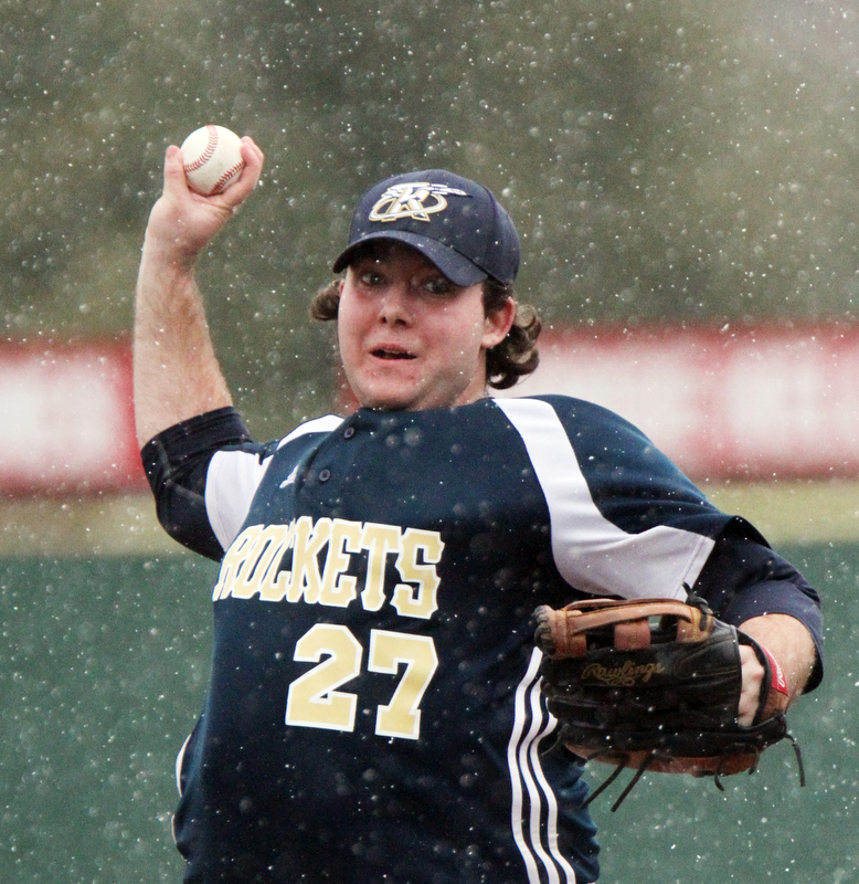 William D. Lewis The Vindicator  Lowellville pitcher Jason Higgins(27) during snowy 4-9-18 game at Cene with Western Reserve.