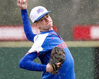 William D. Lewis The Vindicator Western Reserve pitcher Dom Velasquez(24)during snowy 4-9-18 game at Cene with Lowellville.