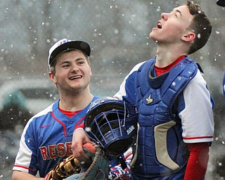 William D. Lewis The Vindicator Western ReserveSeth Phillips(25) and Josh Slaton(16) react at end  during snowy 4-9-18 victory at Cene with Lowellville.