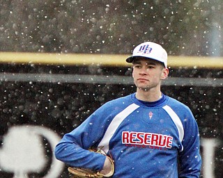 William D. Lewis The Vindicator Western Reserve Dom Velasquez(24)during snowy 4-9-18 game at Cene with Lowellville.