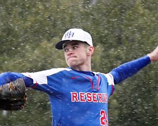 William D. Lewis The Vindicator Western Reserve pitcher Dom Velasquez(24)during snowy 4-9-18 game at Cene with Lowellville.