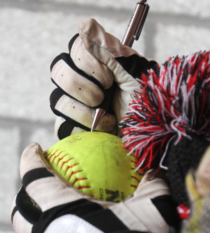 William D. Lewis The Vindicator  YSU softball coach Brian Campbell signs the game ball while celebrating his 500th career win after a win over NKU 4-10-18