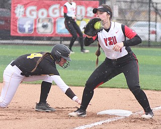 William D. Lewis The Vindicator  YSU Kelly Thompson Cappadocio (7) and KNU's Ava Lawson during 2nd game with NKU 4-10-18.