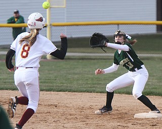 William D. Lewis The Vindicator Mooney's Lauren Frommelt(8) is out at 2nd. Making catch for ursuline is Maris Barbato during 4-11-18 game at Fields of Dreams.