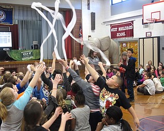 Neighbors | Zack Shively.Beth Colbert of the Carnegie Science Center had some exciting demonstrations to describe scientific concepts. Pictured, she used a leaf blower and toilet paper to explain lift.