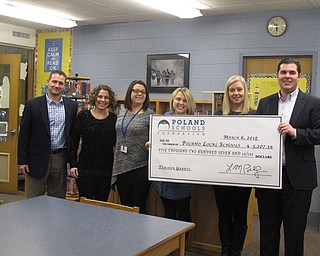 Neighbors | Zack Shively.The Poland Schools Foundation President Luke Politsky met with the district's teachers to present a check for their teacher mini-grants. The grants give teachers an opportunity to address needs in the classroom.