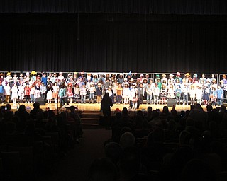 Neighbors | Zack Shively.Musical teacher Dana Emery directed the kindergarten students for their concert. She taught them about proper singing techniques and how to sing well.