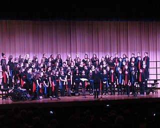 Neighbors | Zack Shively.The sixth-grade sang a variety of songs, including a Shaker folk song and a song in Portuguese. The played a range of tempos as well, such as the slower song "How Beautiful is the Rain?" and quicker song "Mama Don't 'Low No Banjo."