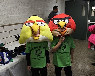 Neighbors | Abby Slanker.Two C.H. Campbell Elementary School students had fun with props at the photo booth during the school’s Spring Fest on March 16.