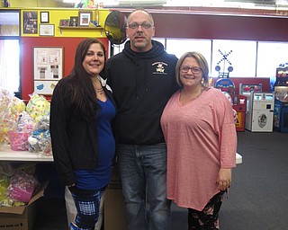 Neighbors | Zack Shively.First American Loans had an Easter celebration at Austintown Bounce on March 24. Pictured are, from left, Jessie Summers, the assistant manager at First American Loans in Austintown, Bruce Shepas, co-owner of Austintown Bounce, and Nicole Patrick of First American Loans.