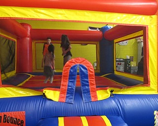 Neighbors | Zack Shively.Austintown Bounce's Easter Eggstravaganza featured a number of Easter activities, but the children could also enjoy the bounce stations and games that the business always provides for the community.