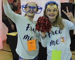 Neighbors | Abby Slanker.Two Hilltop Elementary School students were ready for their close-up with some props at the photo booth at the school’s annual Family Fun Night.