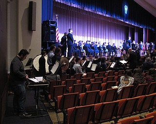 Neighbors | Zack Shively.The symphonic band and concert choir performed during Fitch's National Honor Society ceremony. Pictured, the band, led by director Wesley O'Connor, played a procession as the new inductees walked to the stage.