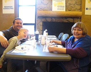 Neighbors | Zack Shively.The Boardman Rotary's proceeds from the pacake breakfast go toward local organizations, such as the schools, and national projects through Rotary International. Pictured are Ryan, Lukas and Susan Raubenstraw.