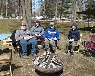 Neighbors | Zack Shively.Boardman Park set up a few events outside during the weekends of the Maple Syrup Festival. They had Boy Scouts with a camping demonstration, wagon rides through the woods and a disc golf tournament. Pictured are, from left, Anthony DeLuca, Jacob Burkey, Mark Filicky and Nathan Mclaine around a campfire.