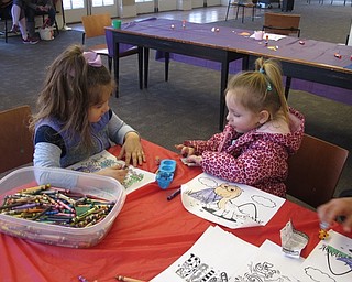 Neighbors | Zack Shively.The children at the "Spring Things" event at the Poland library did a craft based on a story they read at story time. Pictured, Addison Shilling and Arianna Diaz colored after they made crafts.