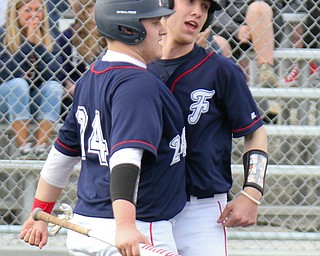 Fitch's Robby Russo (24) and Cole Constance (5) bump chests after Constance score during 4-12-18 game with Columbiana.

William D. Lewis - The Vindicator