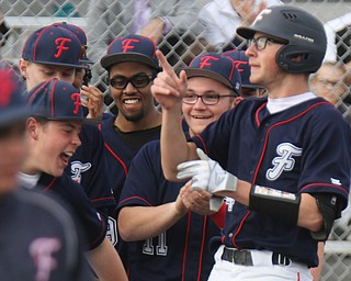 Fitch's Nick Belcik (14), right, gets congrats after hitting his first homer during 4-12-18 game with Columbiana.

William D. Lewis - The Vindicator