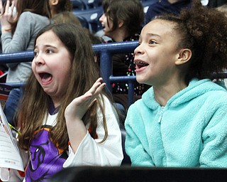 William D. Lewis The Vindicator Austintown Intermediate School 3rd graders Dakota Kasner,left, and Audrianna Parker enjoy hte action of Phantoms vs Team USA game 4-12-18 at Covelli. Students from area schools visited the Covelli for a hockey game.