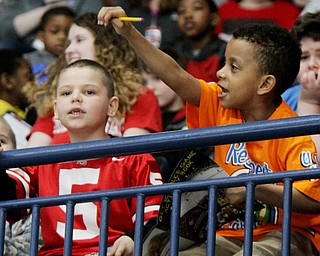 William D. Lewis The Vindicator EJ Blott school, Liberty 2nd graders Tyler Hallett, left, and Paul Peoples enjoy th action of Phantoms vs Team USA game 4-12-18 at Covelli. Students from area schools visited the Covelli for a hockey game.