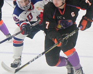 William D. Lewis The Vindicator Phantoms Eric Esposito(7) and USA's Ryder Rolston(45) during game 4-12-18 at Covelli. Students from area schools visited the Covelli for a hockey game.
