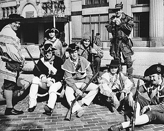 RECRUITS NEEDED - Joseph Alessi (standing left), commander of the Mahoning Valley Colonial Brigade, is seeking recruits for the group and asks interested persons to attend a meeting at 2:30 p.m. Today in the Bicentennial offices, 7 Federal Plaza West.  Parading Saturday in the plaza in observance of Washington's Birthday were (seated, from left) Terry Noble, Bill Jones, Roy Moore, and Arnold Ylonen and (standing from left) Alessi, Harry Noble, Jim Mann, and George Wedlin.

Photo published February 23, 1975.