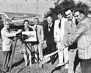 VALLEY FOUNDERS MEMORIAL - A bicentennial memorial of white Vermont granite will pay tribute to Youngstown's first settlers.  Taking part in ground-breaking ceremonies at Spring Common Bridge and Federal Plaza this morning were: (left to right) Walter Damon, architect and co-chairman for the memorial: Mrs. Walter Schaff, vice chairman of the Bicentennial Commission; Edward J. Hulme, director of the Bicentennial Commission; Prosecuting Atty. Vicent Gilmartin, representing Mahoning County; John Logue, of the Builders Association of Eastern Ohio and Western Pennsylvania, co-chairman for the memorial; Ted M. Kramer, business agent of Carpenters Local 171, and Louis Rich, business agent for Cement Masons Local 179.  It is being constructed under the Joint Apprenticeship Program.  (Story on Page 8)

Photo published September 9, 1975.

Photo by Paul R. Schell.