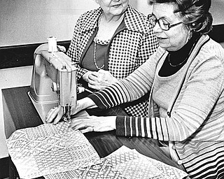 STITCH IN TIME - Mrs. Edward Reese (left) and Marietta Bagnall are working on patchwork napkins for the bazaar.  Reservations are needed for the luncheon from 11 a.m. to 2 p.m.  A sandwich bar will be available for those who do not want a full course meal.

Photo by Paul R. Schell.