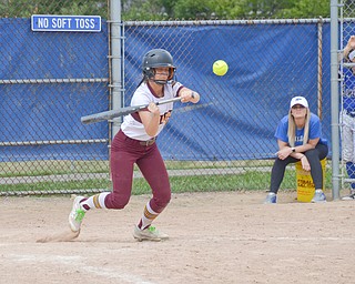 South Range's #17, Bree Kohler, lays down a text book bunt during their game against Poland Seminary in Poland on Saturday, April 14, 2018.

Photo by Scott Williams - The Vindicator