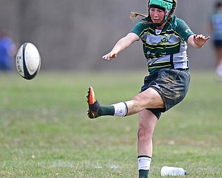 YOUNGSTOWN, OHIO - APRIL 14, 2018: Abby Waine kicks the ball for the point after try during a rugby match, Saturday morning in Youngstown. DAVID DERMER | THE VINDICATOR