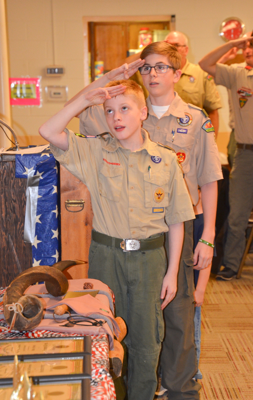 Boy Scouts Cole Williams (left) and Patrick Kelly lead the room in the Pledge of Allegiance at the Whispering Pines Recognition Dinner at St. James Episcopal Church in Boardman on Sunday, April 15, 2018.

Photo by Scott Williams - The Vindicator