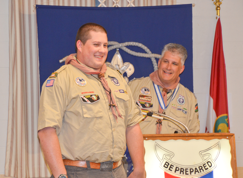 Kurt Hilderbrand, right, recognizes his son Kent at the Whispering Pines Boy Scouts Recognition Dinner at St. James Episcopal Church in Boardman on Sunday, April 15, 2018.  Kent received the Summit Award, which is the highest award in venturing.

Photo by Scott Williams - The Vindicator