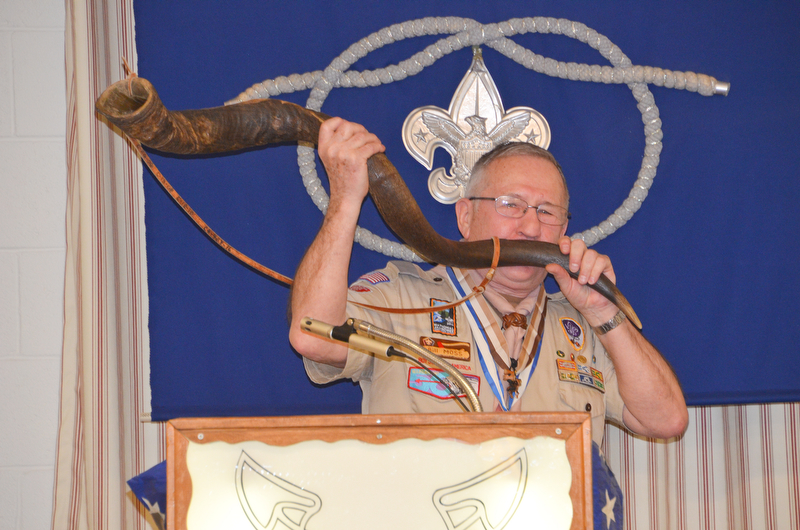 Bill Moss, district training chairman, blows the Kudu horn to begin the Wood Badge Ceremony at the Whispering Pines Recognition Dinner at St. James Episcopal Church in Boardman on Sunday, April 15, 2018.

Photo by Scott Williams - The Vindicator