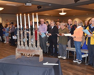 About 100 people, many of which were 2nd generation Holocaust survivors, gathered for a Shoah Memorial Ceremony held at the Jewish Community Center on Sunday, April 15, 2018.  The six candles represent the six million who were lost during the Holocaust.

Photo by Scott Williams - The Vindicator