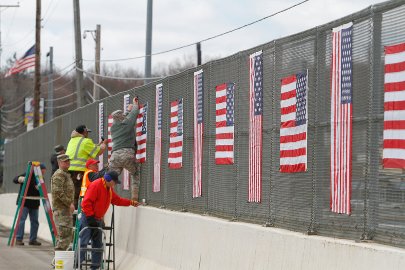 The Mahoning County Veterans Service was busy putting up flags over one of several bridges in Mahoning County. Three bridges are slated to get the flags. They are the state Route 46 overpass in Austintown over interstates 80 and 76; Mahoning Avenue over state Route 11 and state Route 164.