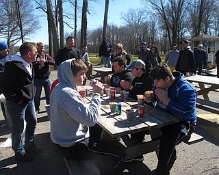 Neighbors | Zack Shively.High school students from Poland and Lowellville competed in a chili eating contest during the Poland Rotary's Chili Open. Pictured are Poland High School students, the winning team, chowing down on three cups of chili, four saltine crackers and a can of soda.