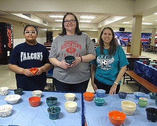 Neighbors | Zack Shively.The Council of PTA sold bowls at the Souper Supper. The Fitch ceramics class and the fifth-grade students made the bowls for the dinner. Pictured are, from left, Lydia Howard, LeeAnn Plunkett and Lori Rektor.