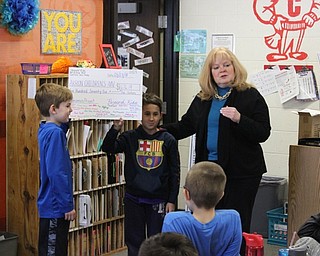 Neighbors | Abby Slanker.Marie Rupert’s Hilltop Elementary School third-grade class presented Senior Director of Development at Akron Children’s Hospital Mahoning Valley JoAnn Stock a ‘check’ for $676.19 on March 23. The class raised the money through an economics project.