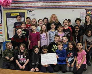 Neighbors | Abby Slanker.Senior Director of Development at Akron Children’s Hospital Mahoning Valley JoAnn Stock (back, center) visited Marie Rupert’s Hilltop Elementary School third-grade class to accept a donation of proceeds from Paracord Kids, the students’ business in an economics project.