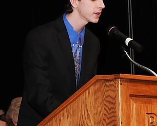 Neighbors | Submitted .Noah Landry, President of the Poland National Honor Society, gave a speech on the history of NHS at the Inductions Ceremony on Feb. 21.