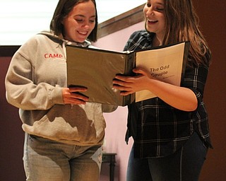 Neighbors | Abby Slanker.“The Effect of Gamma Rays on Man-in-the-Moon Marigolds” Stage Manager Grace Schuler (left) and “The Odd Couple” Stage Manager Marina Campos conferred over a script as the Canfield High School Players prepared to perform the two plays April 21-22.