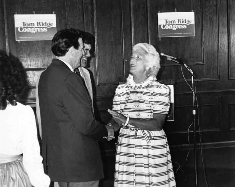GREETS REPUBLICANS - Barbara Bush, wife of Vice President George Bush, greets participants in a Ridge for Congress rally Monday at the Sheraton Inn, West Middlesex. Republicans Tom Ridge of Erie, candidate for the 21st District, is visible to her left. Mrs. Bush also took part in the centennial anniversary celebration of a Sharpsville church built by her great-great-grandmother, Chloe Holbrook Pierce.

 Article written by Harold Gwin, Vindicator Sharon Bureau. 

Unknown date.


"Barbara Bush 9:45 a.m. today (Tues.) Panella Penn today"