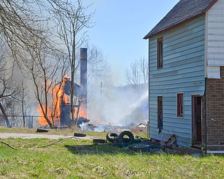 Around 3:30pm on Friday, April 20, 2018, the Youngstown Fire Department was called to a vacant structure fire at 463 South Forest Avenue in Youngstown.  Crews let it burn and focused mostly on keeping it contained, as it caught the yard on fire.  

Photos by Scott Williams - The Vindicator .