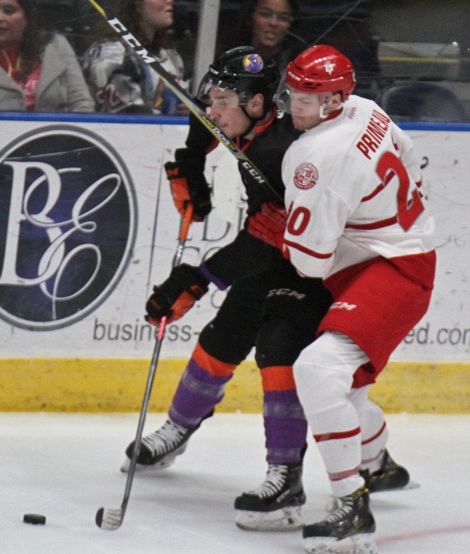 William D. Lewis The Vindicator   Phantoms Joey Abate(17) and ) and Saints Chayse Primeau920) during 4/20/18 action in Youngstown.