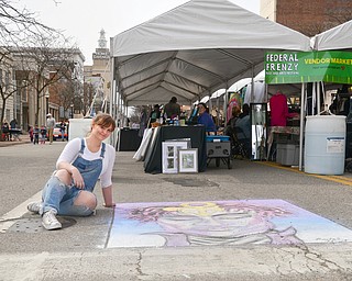 Rachel Hritz, 18, from Boardman, signed up to do "live art," making a chalk drawing of Prince, at the Federal Frenzy Music and Arts Festival on West Federal Street in downtown Youngstown on Saturday, April 21, 2018.  

Photo by Scott R. Williams - The Vindicator