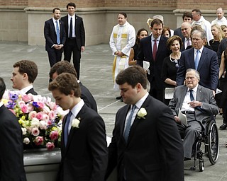 Former President George H.W. Bush and George W. Bush, followed by former first lady Laura Bush follow as pallbearers carry the casket of former first lady Barbara Bush after a funeral service at St. Martin's Episcopal Church, Saturday, April 21, 2018, in Houston. (AP Photo/Evan Vucci)
