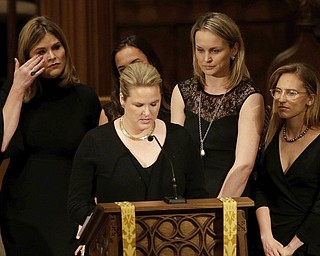 Jenna Bush, left, wipes away tears as granddauters gather to speak during a funeral service for former first lady Barbara Bush at St. Martin's Episcopal Church, Saturday, April 21, 2018, in Houston. (AP Photo/David J. Phillip , Pool)
