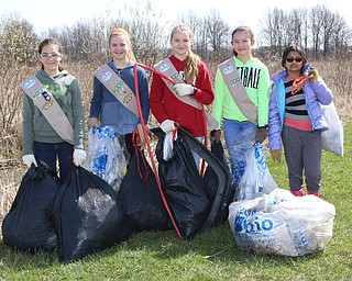 L-R) Charley Masters, Katie Padgett, Emily Heino, Anna Kerns, and Sofia Sharif of the Girl Scouts from Canfield Troop 80095 cleaned up litter throughout the Mill Creek Preserve on Western Reserve Rd in Boardman on Saturday Morning.  Dustin Livesay  |  The Vindicator  4/21/18