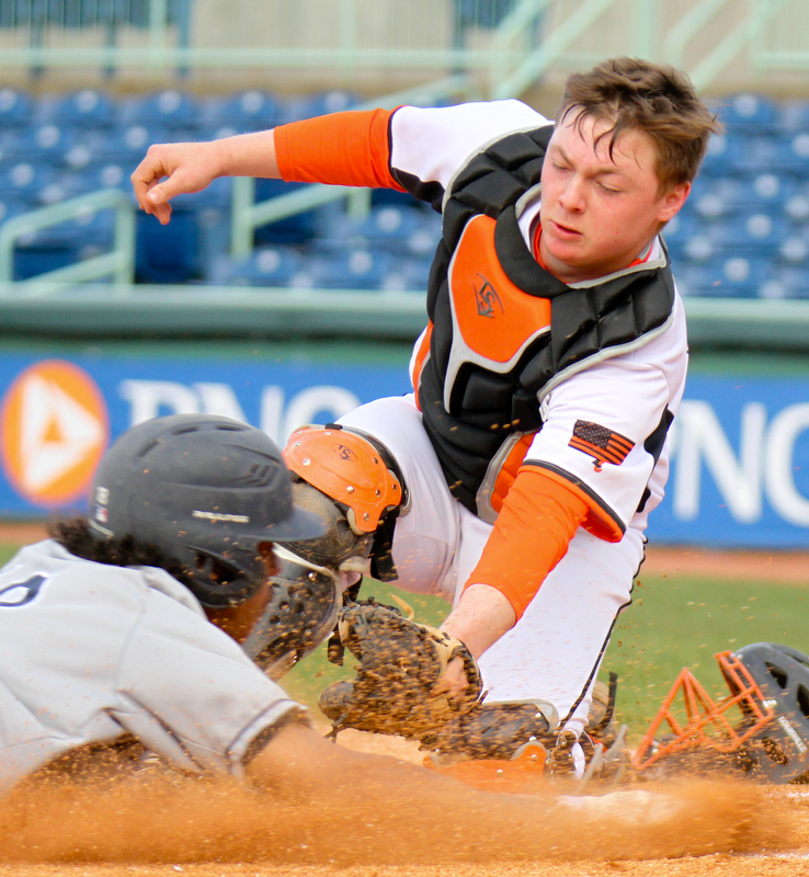 William D. Lewis The vindicator  Howland catcher Cameron Durig tags Fitch's Jeremiah Papa(18) out at the plate during first inning action 4-23-18  at Eastwood